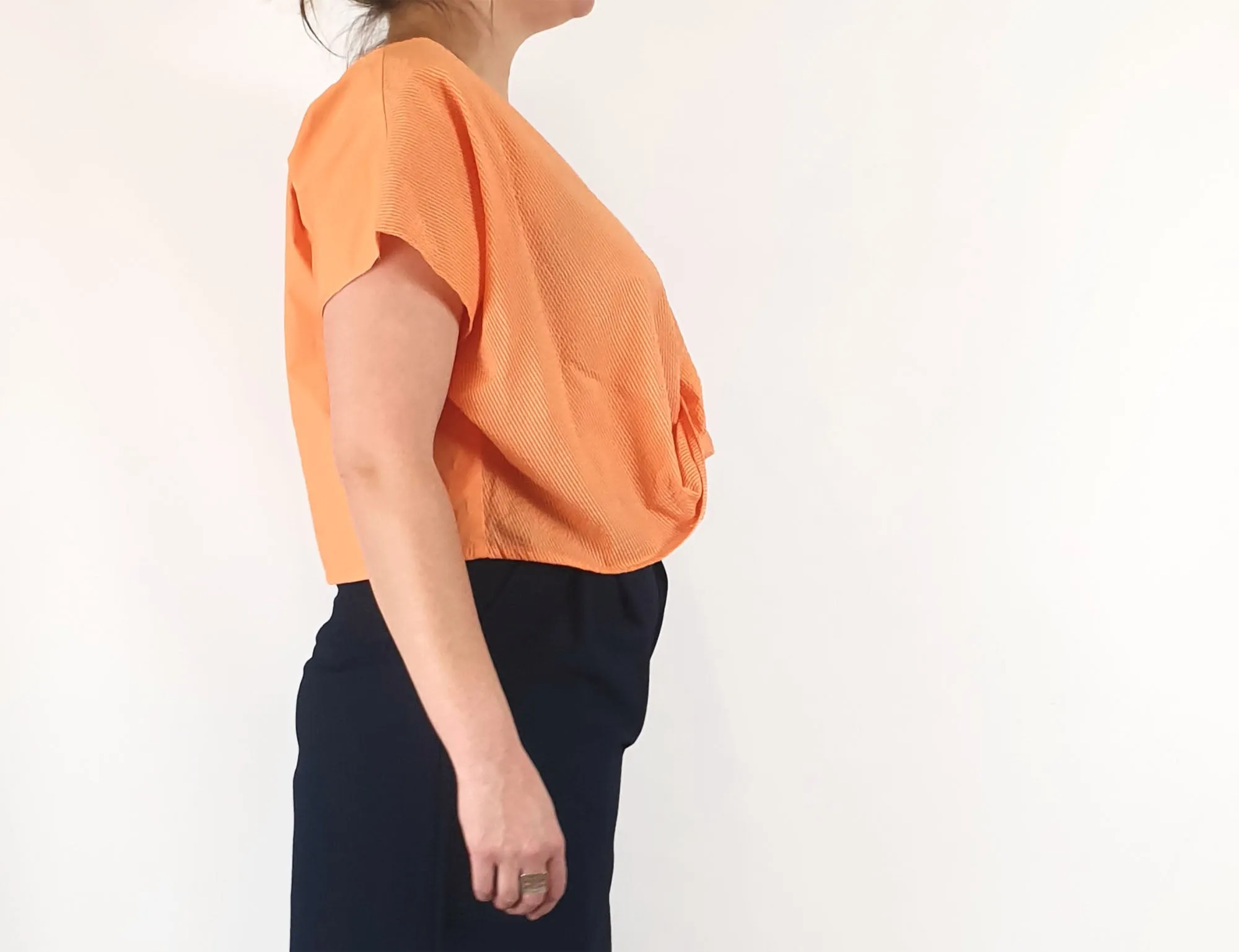 Kuwaii cropped orange top size 16