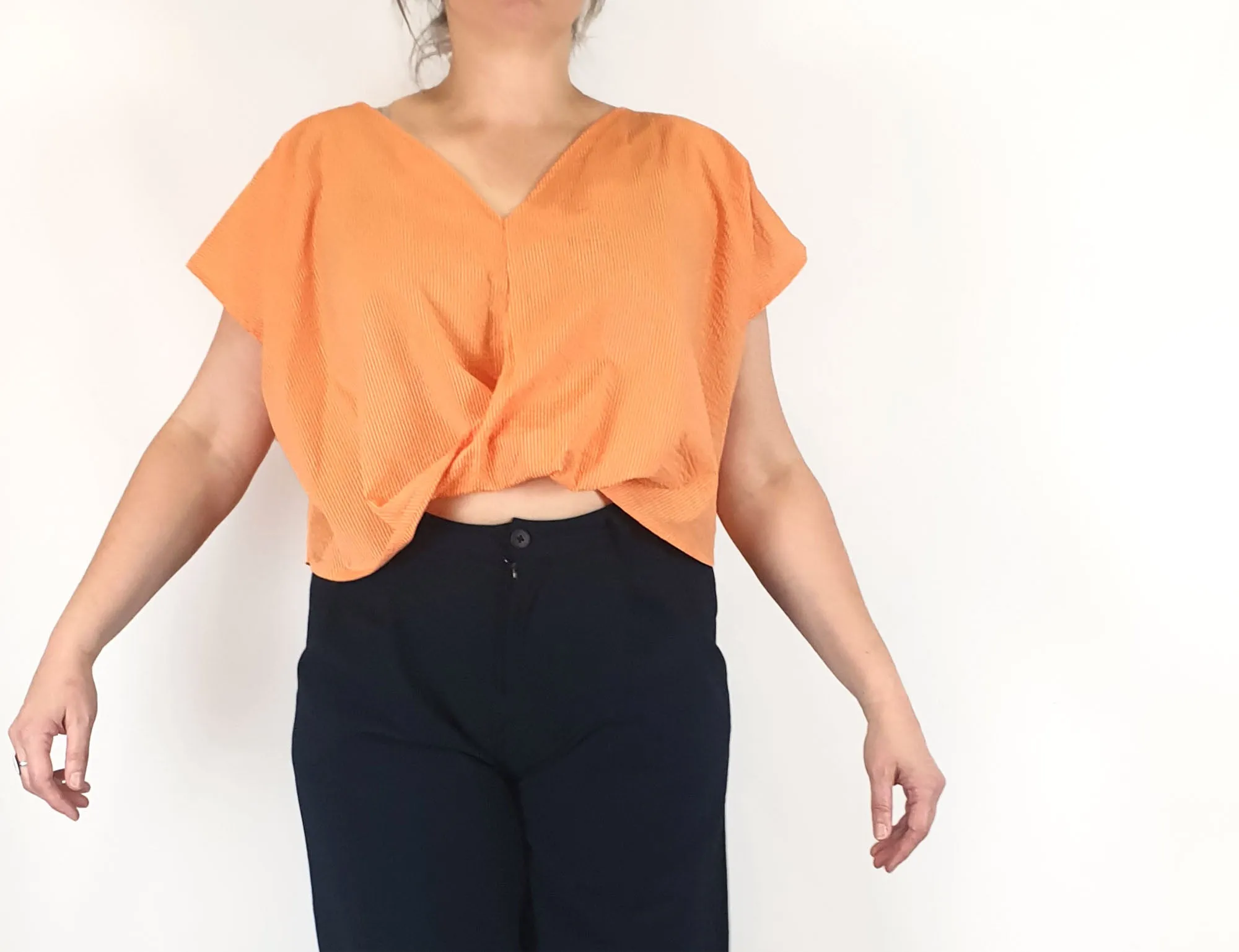 Kuwaii cropped orange top size 16