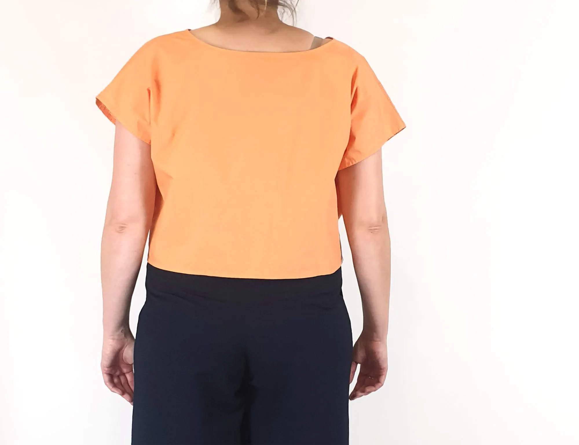 Kuwaii cropped orange top size 16