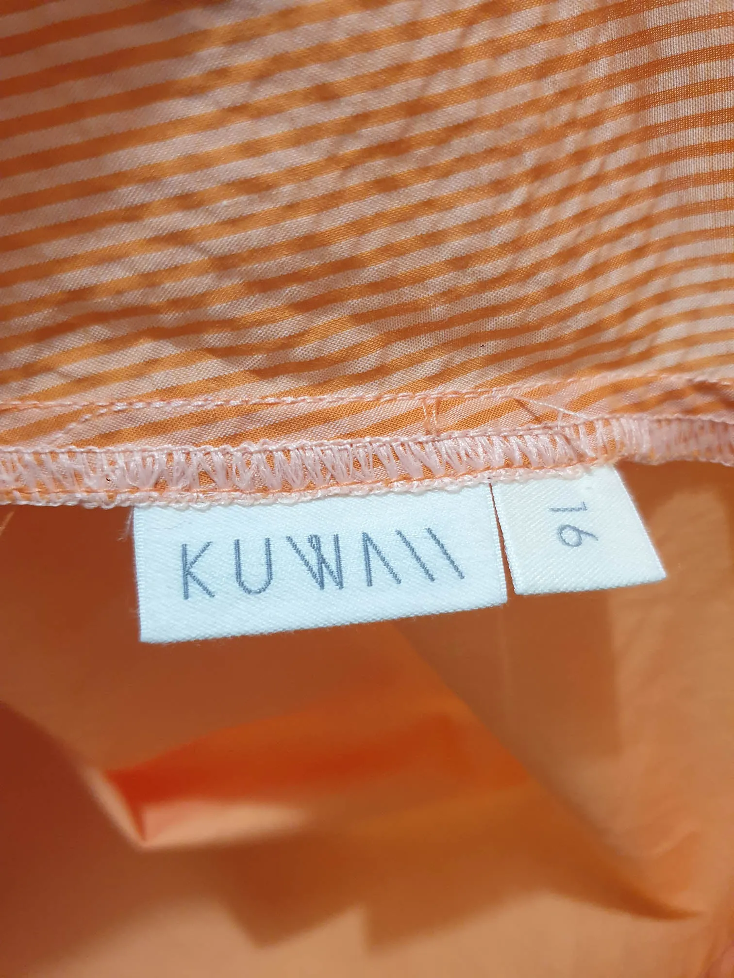 Kuwaii cropped orange top size 16