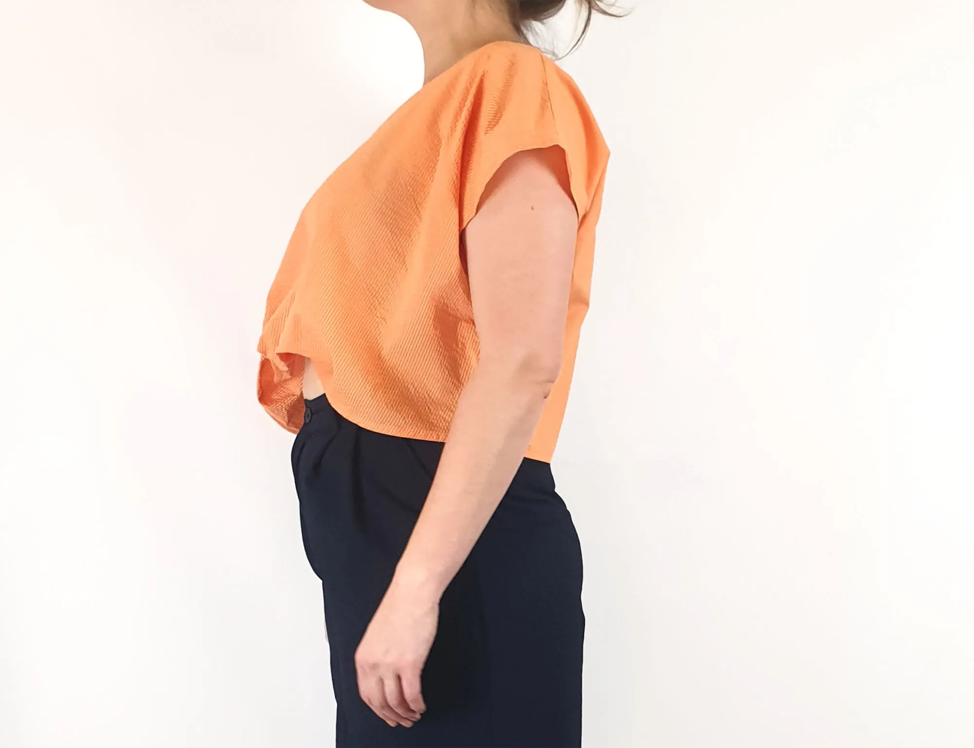 Kuwaii cropped orange top size 16