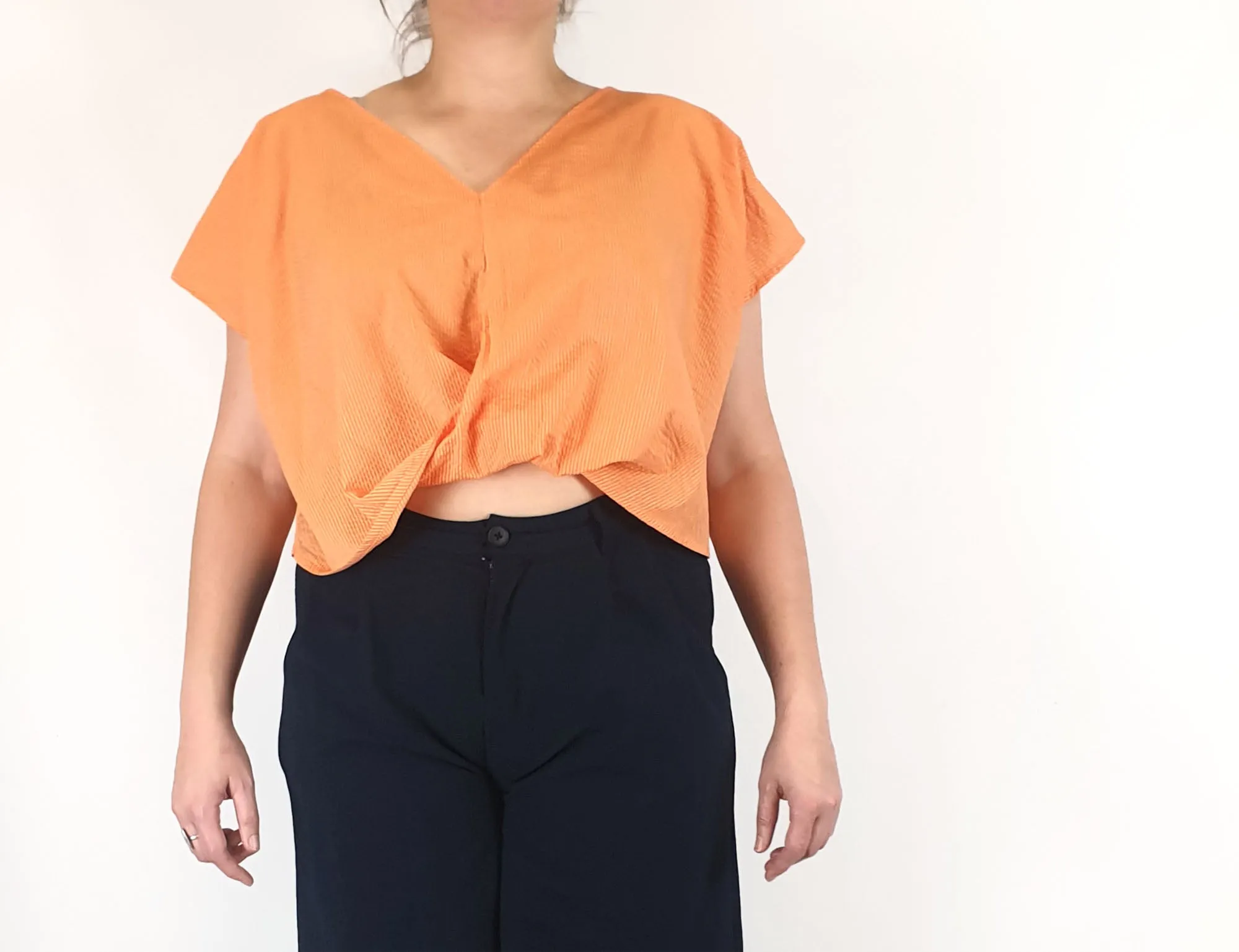 Kuwaii cropped orange top size 16